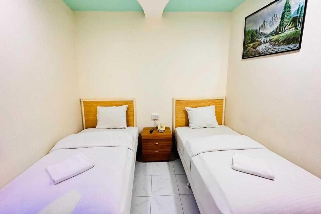 Sharjah Plaza Hotel Bagian luar foto